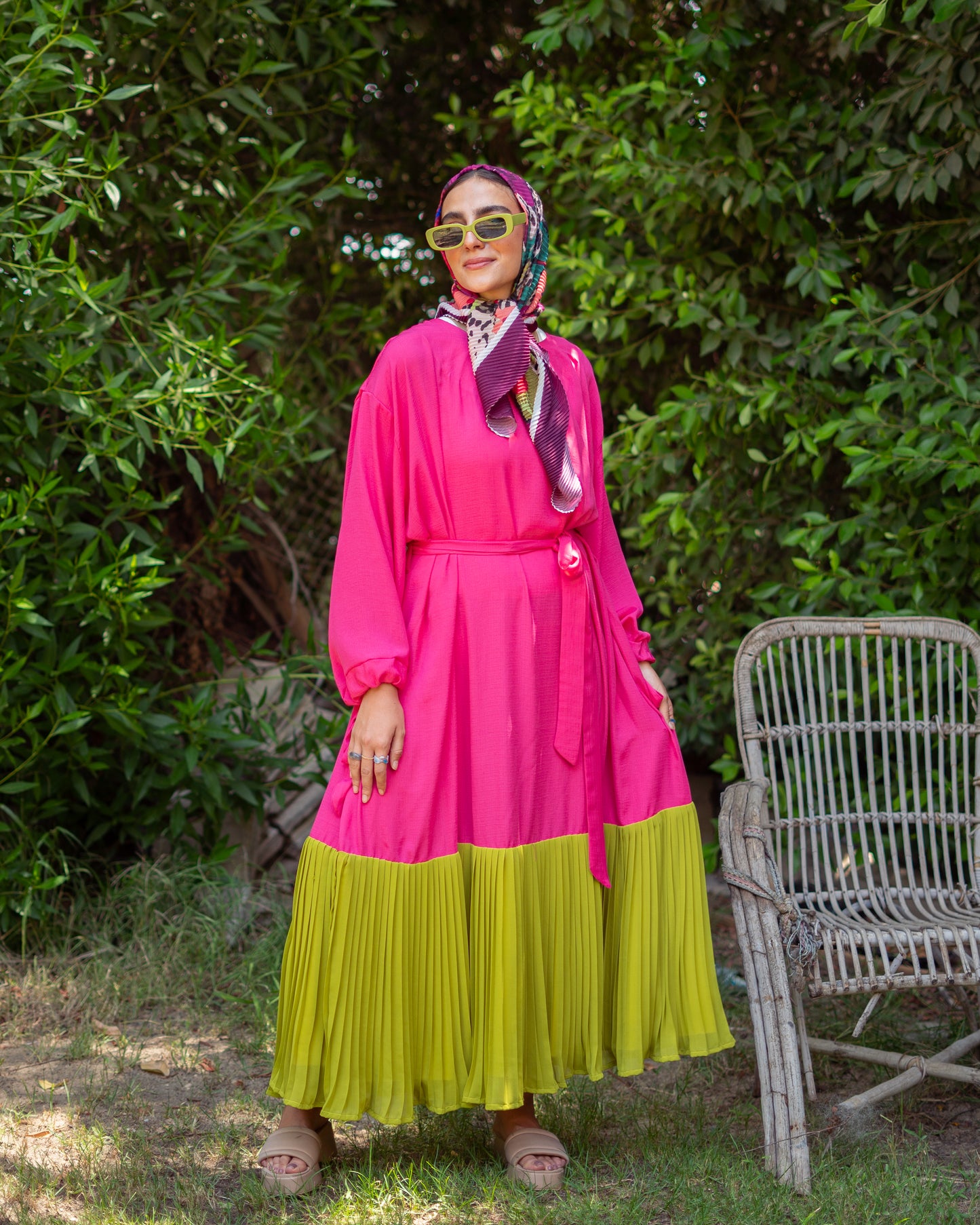 Dress with pleated ends