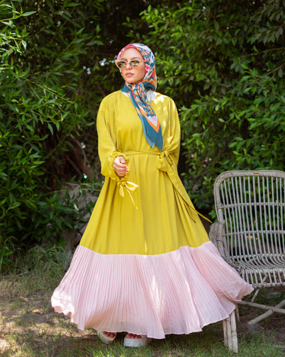 Dress with pleated ends